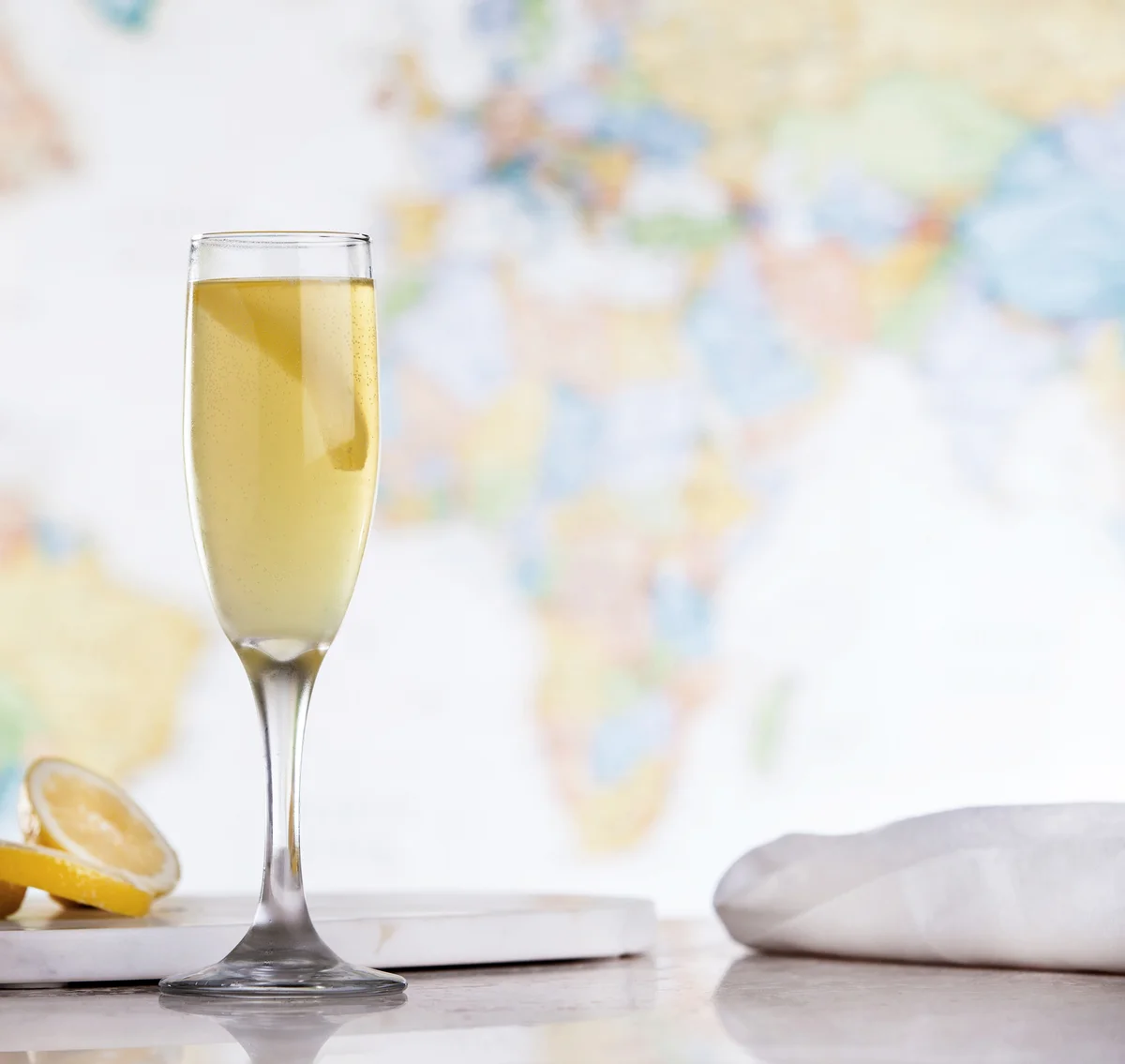 French 75 cocktail with a lemon twist