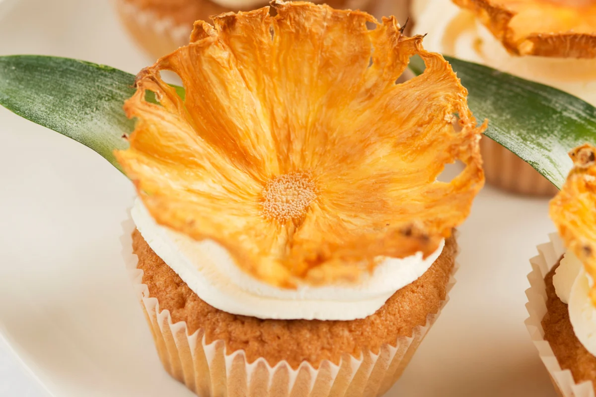 Cupcakes decorated with dried pineapple chips