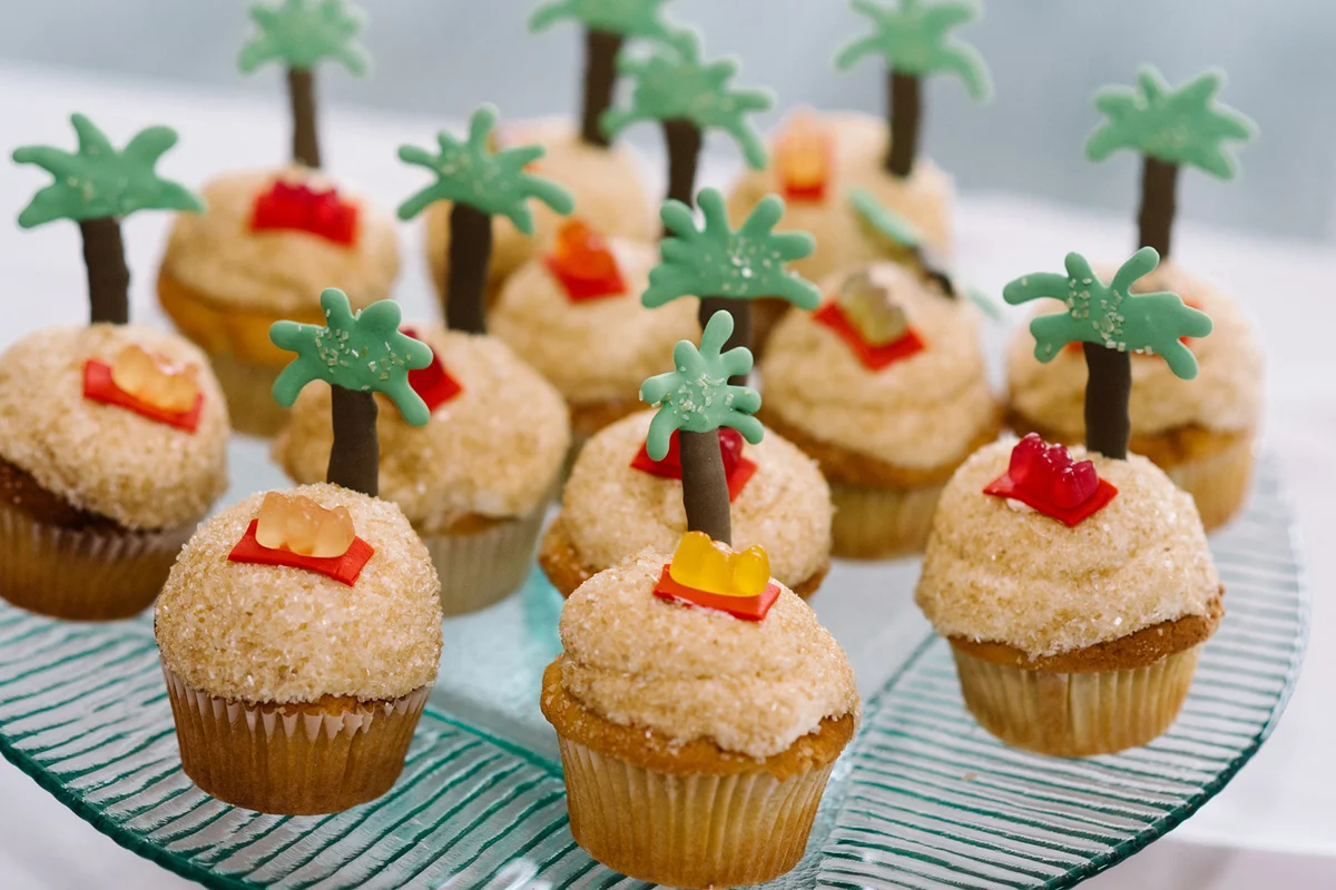 Luau themed cupcakes on a plate