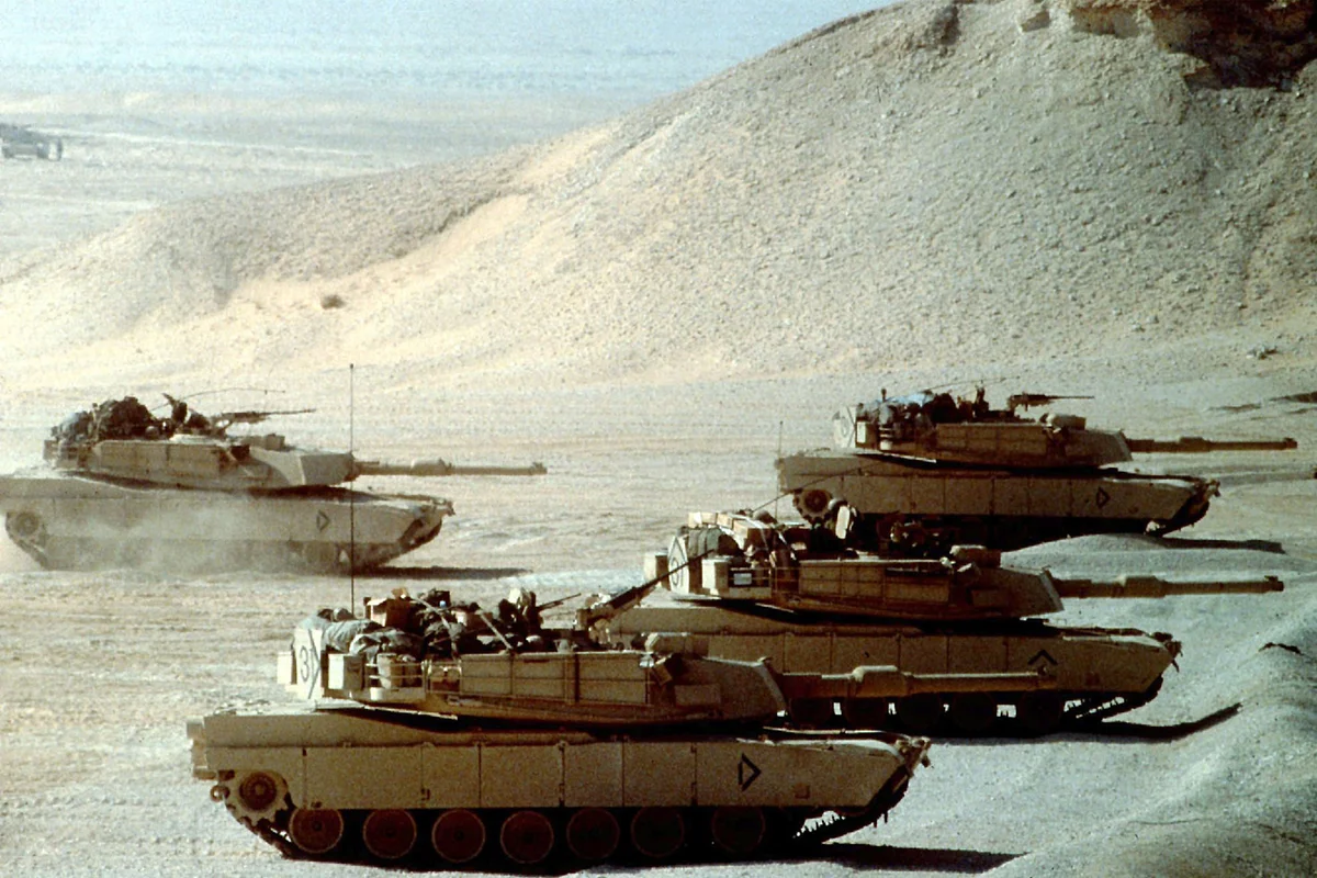 Battle tanks test their guns during Operation Desert Shield - Getty Editorial Use