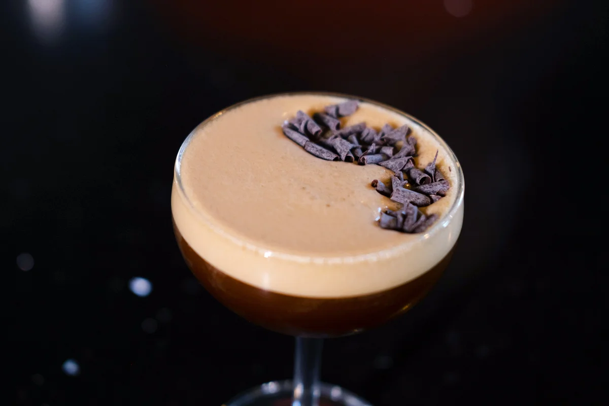 Espresso Martini cocktail garnished with grated chocolate