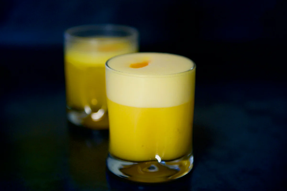 Yellow drinks on table