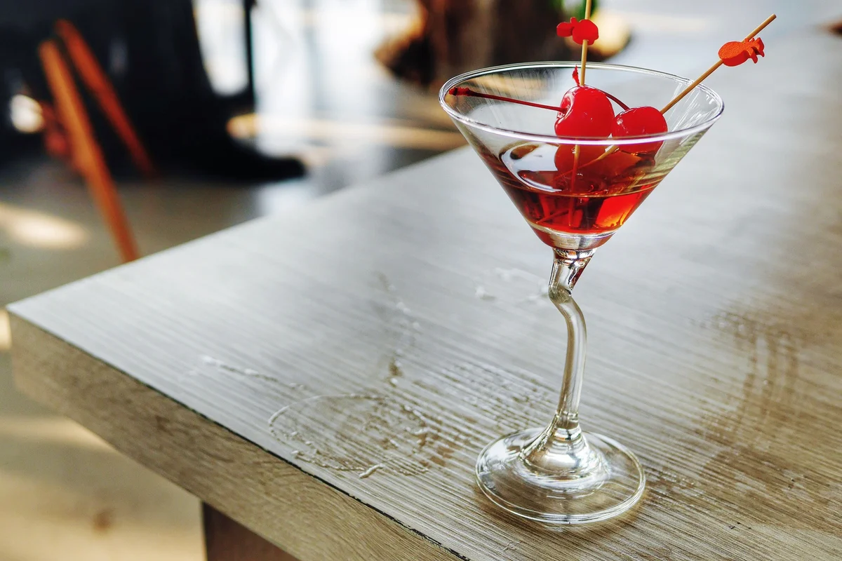 Red Drink In Martini On Table