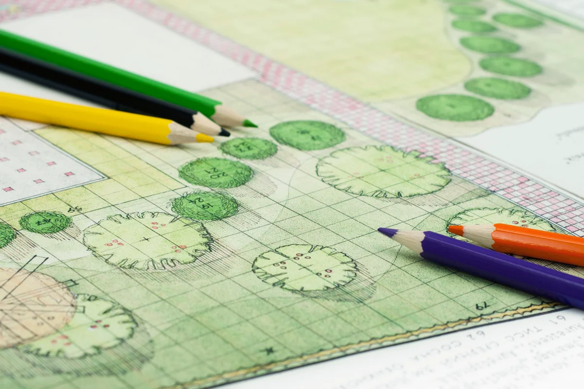 Landscape architect drawing and colored pencils