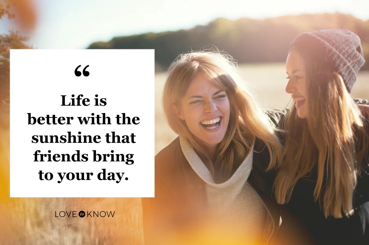 Smiling women together outdoors