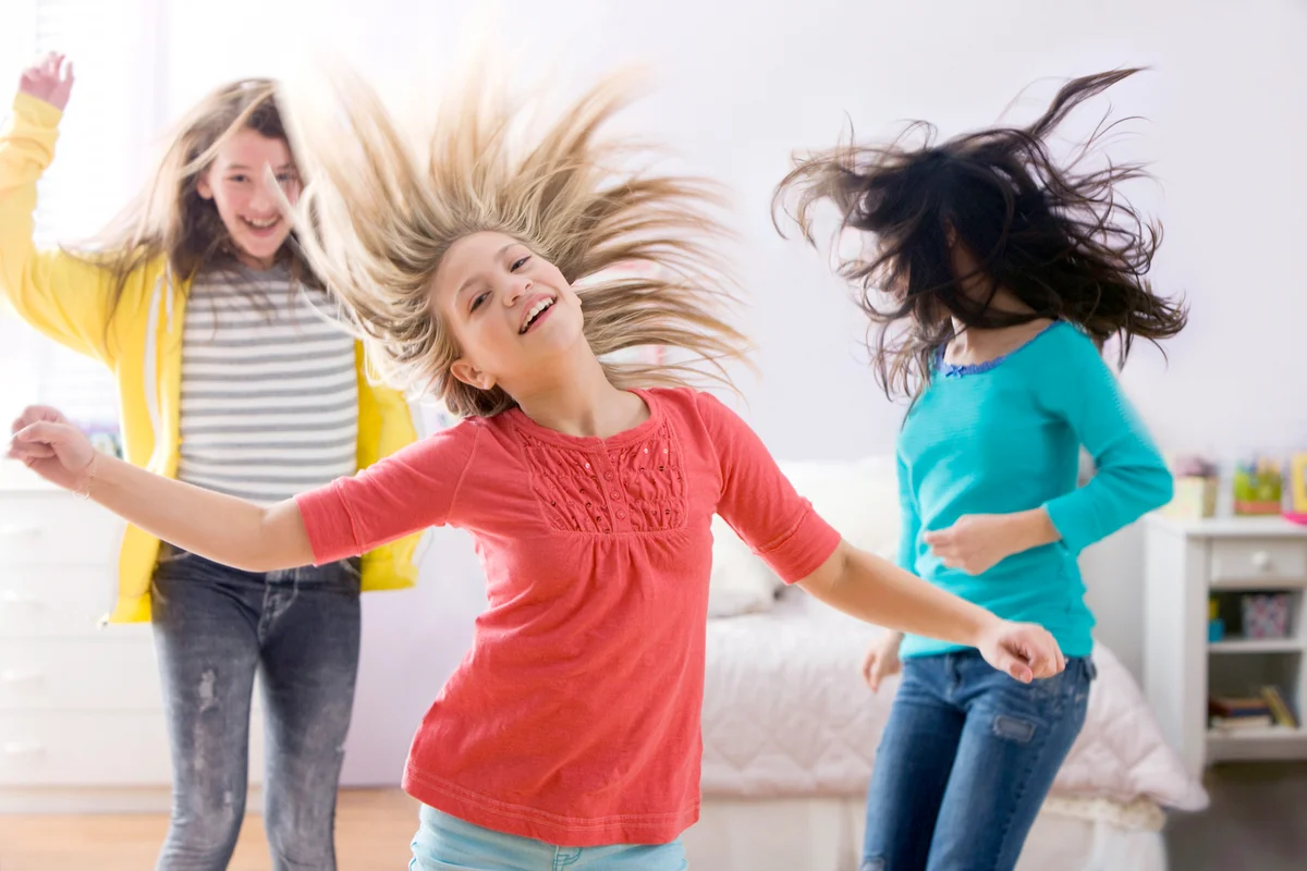 Happy girls dancing