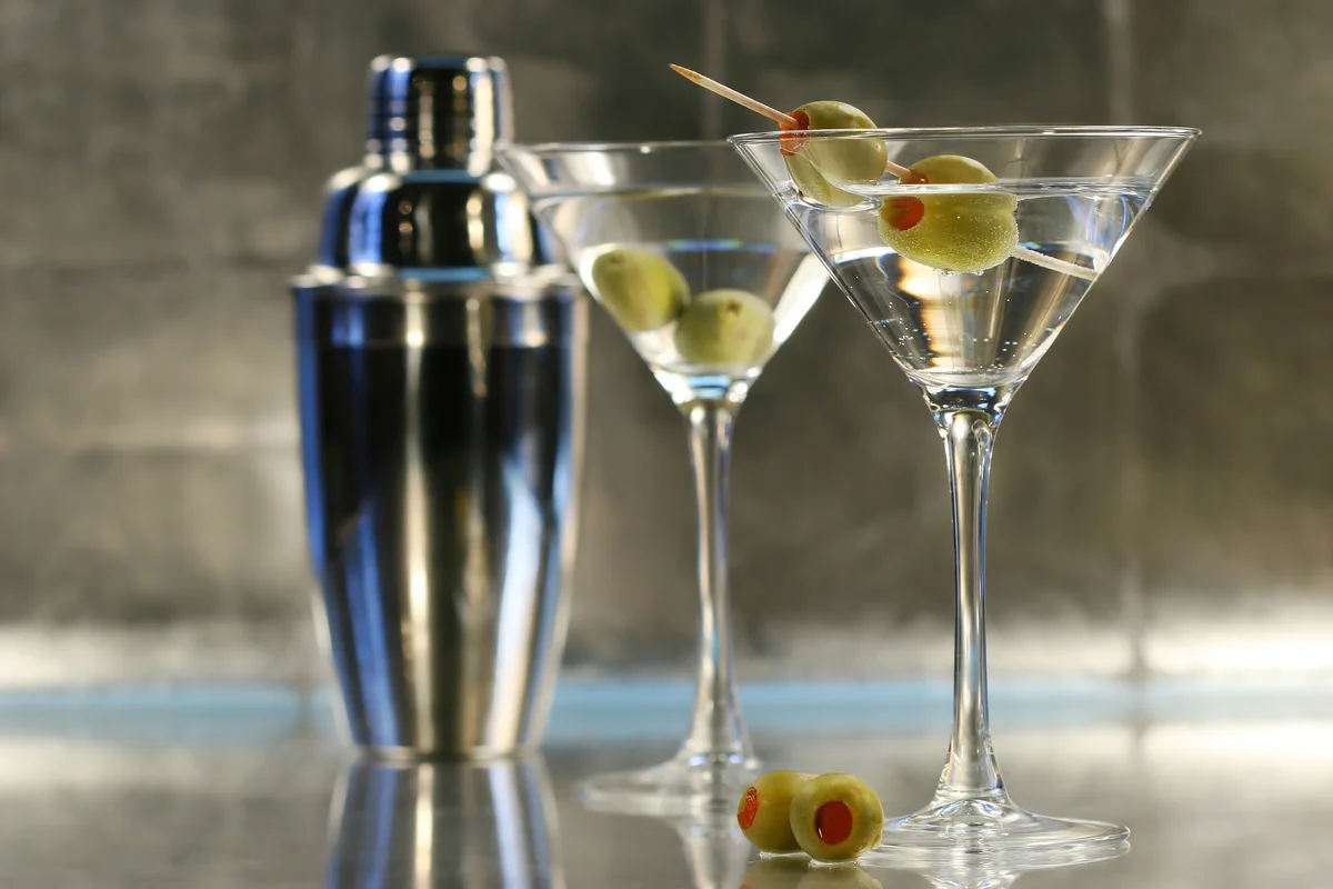 classic martini cocktail with olives