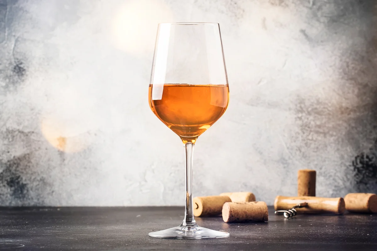 Orange wine in big wine glass