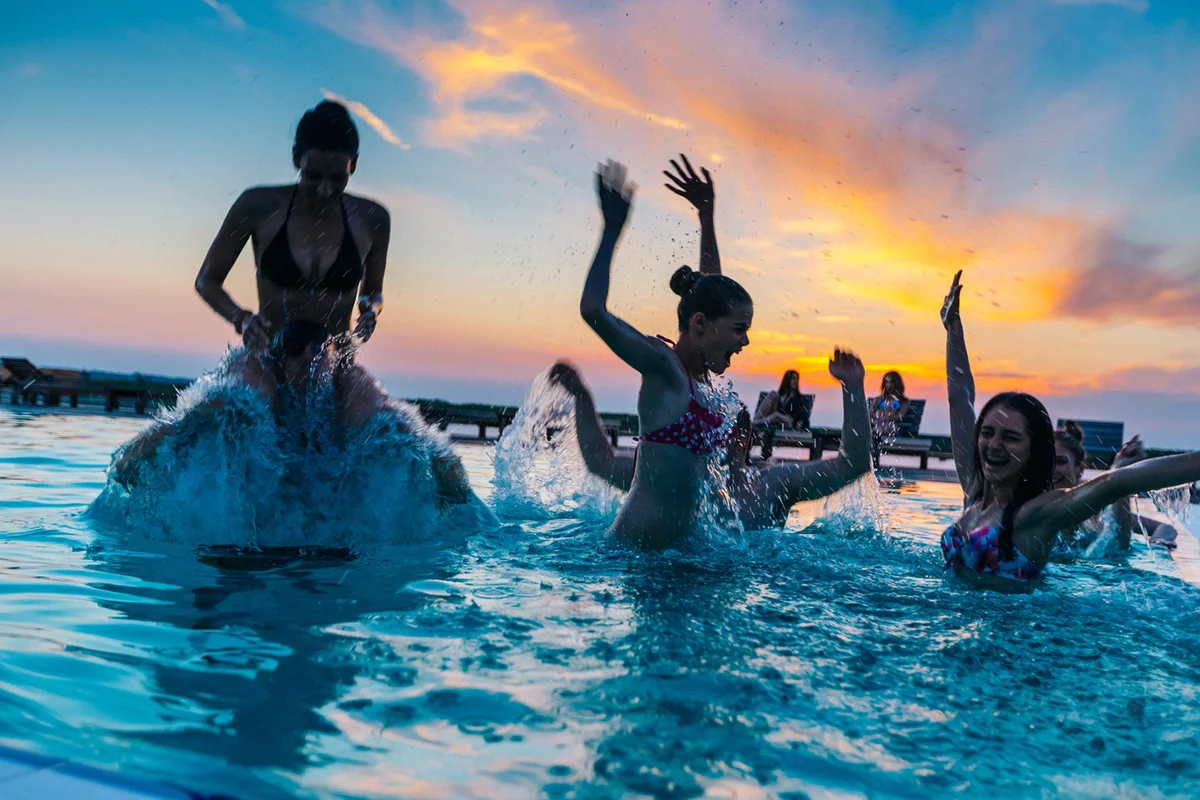 Friends enjoying a pool party