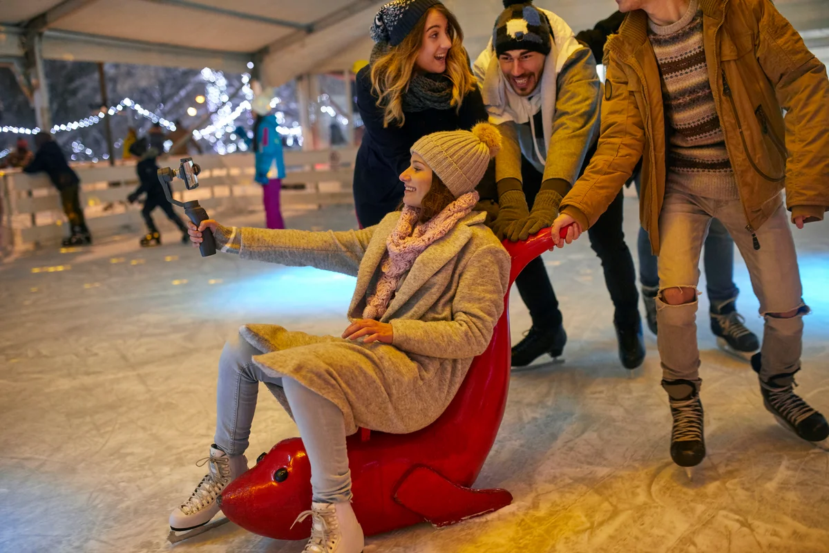 friends celebrating ice skating birthday party