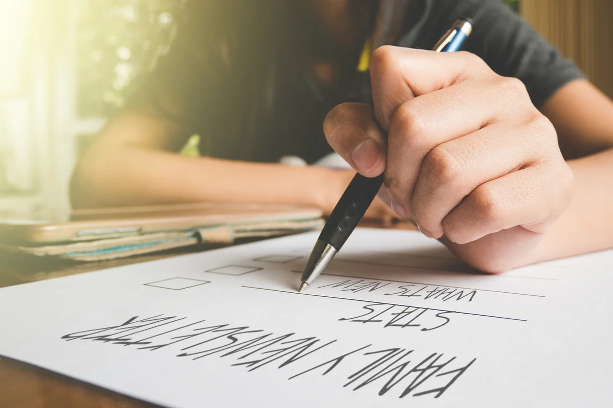 Woman working on family newsletter