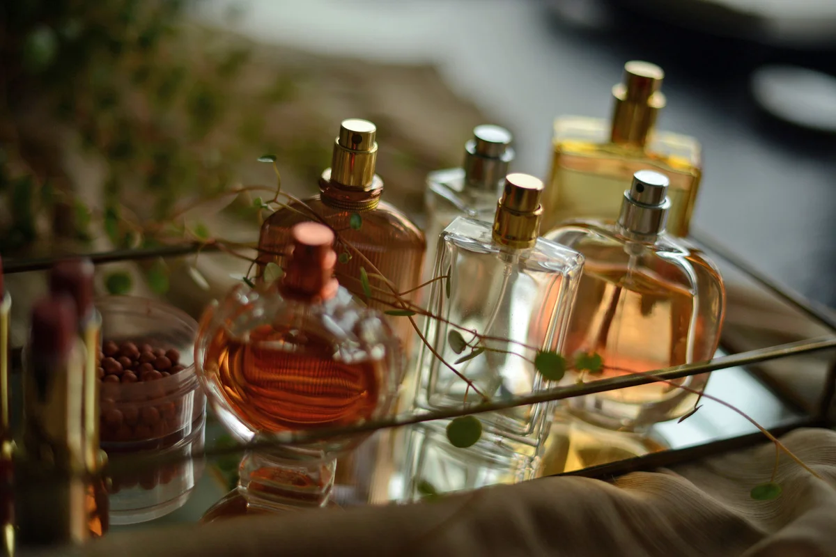 mirrored tray with perfume bottles