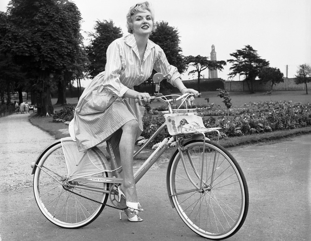 woman on Raleigh bicycle from 1958