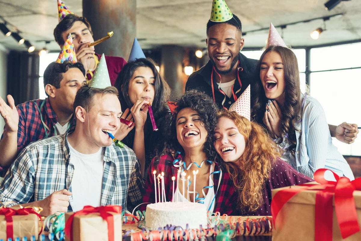 Happy friends at birthday party