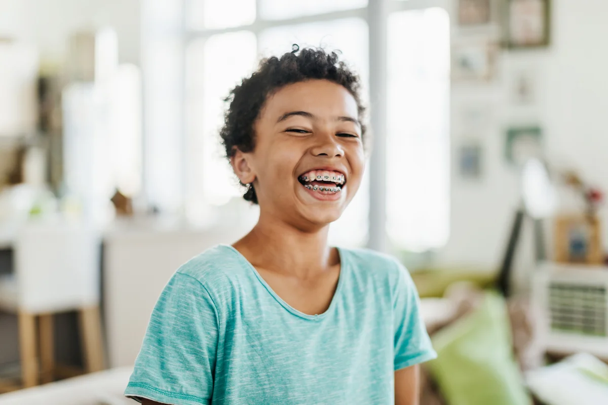 teen boy laughing