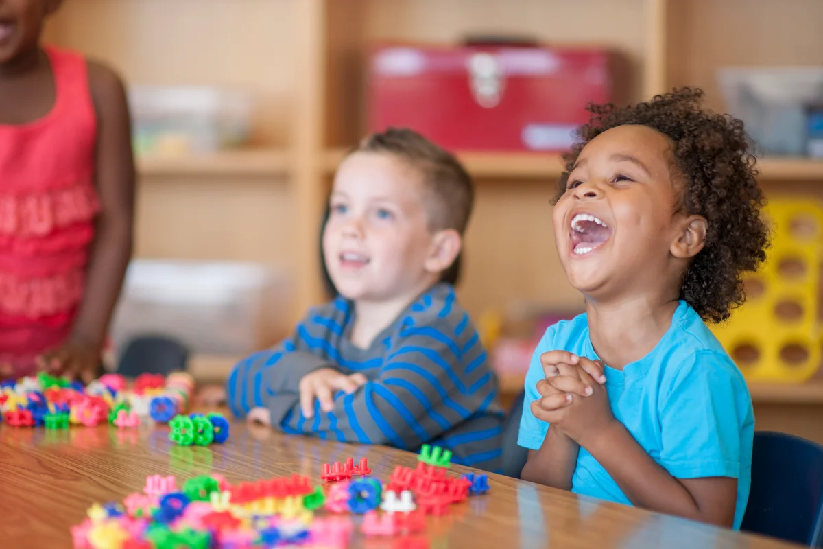 preschool children laughing