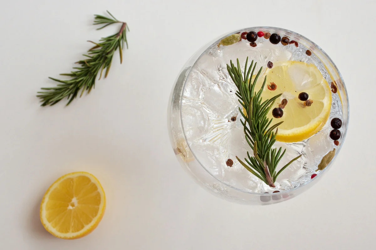 cocktail garnish rosemary peppercorn lemon wheel