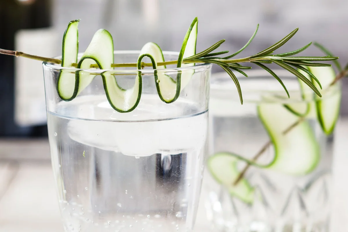 cucumber ribbon on a rosemary skewer