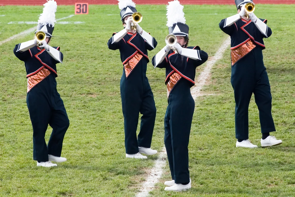 Trumpet line performing a halftime show