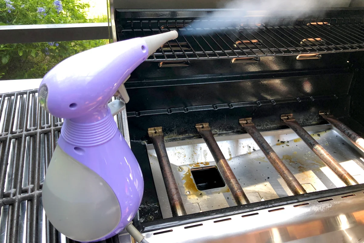 Steam cleaning the barbecue grill