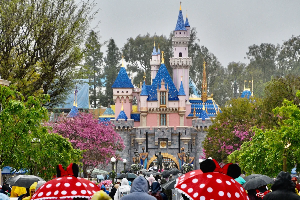 Head towards Sleeping Beauty Castle at Disneyland in Anaheim, CA,