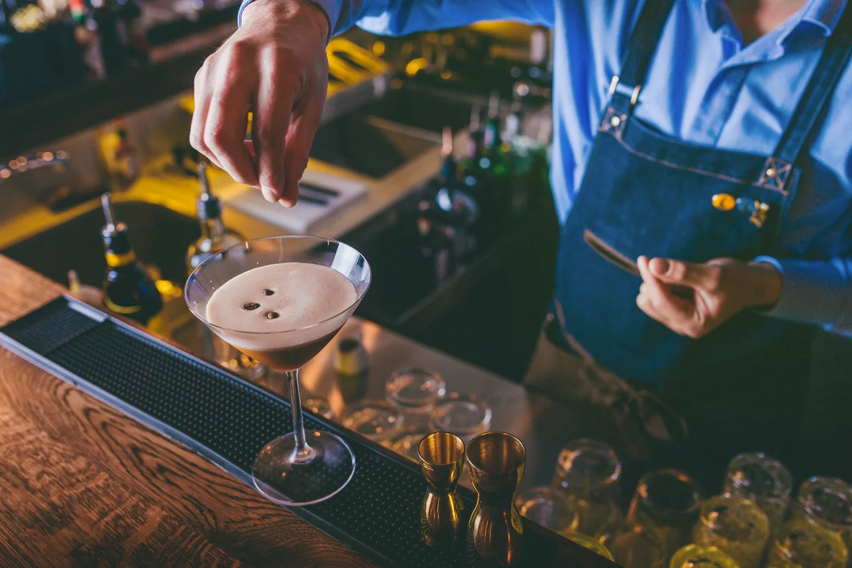 Barista making coffee martini
