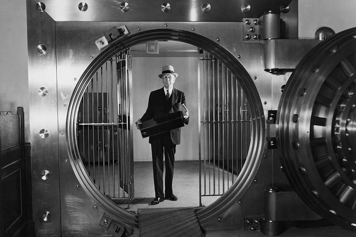 man standing in bank vault 1936