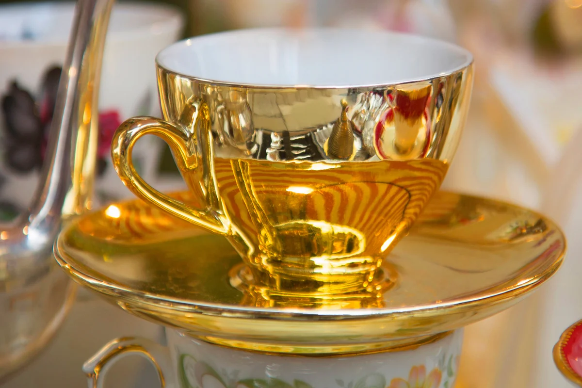 Golden tea cup
