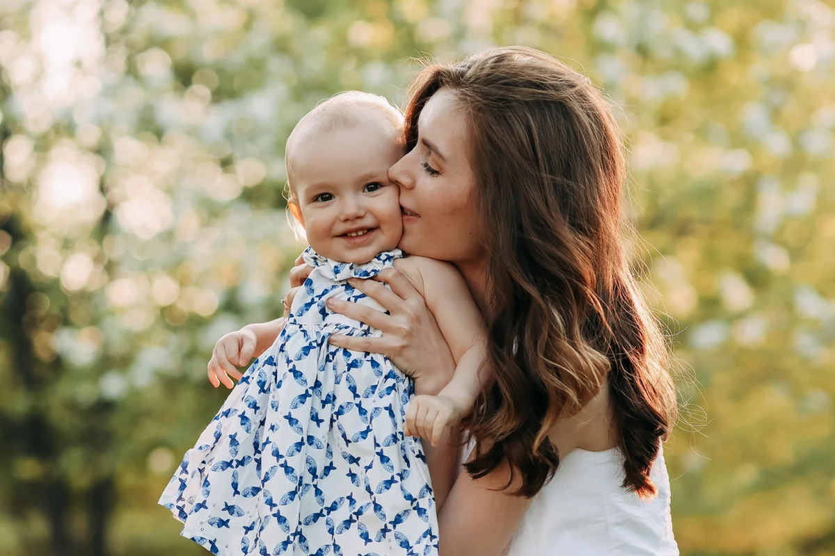Mother And Child Have Fun In The Park