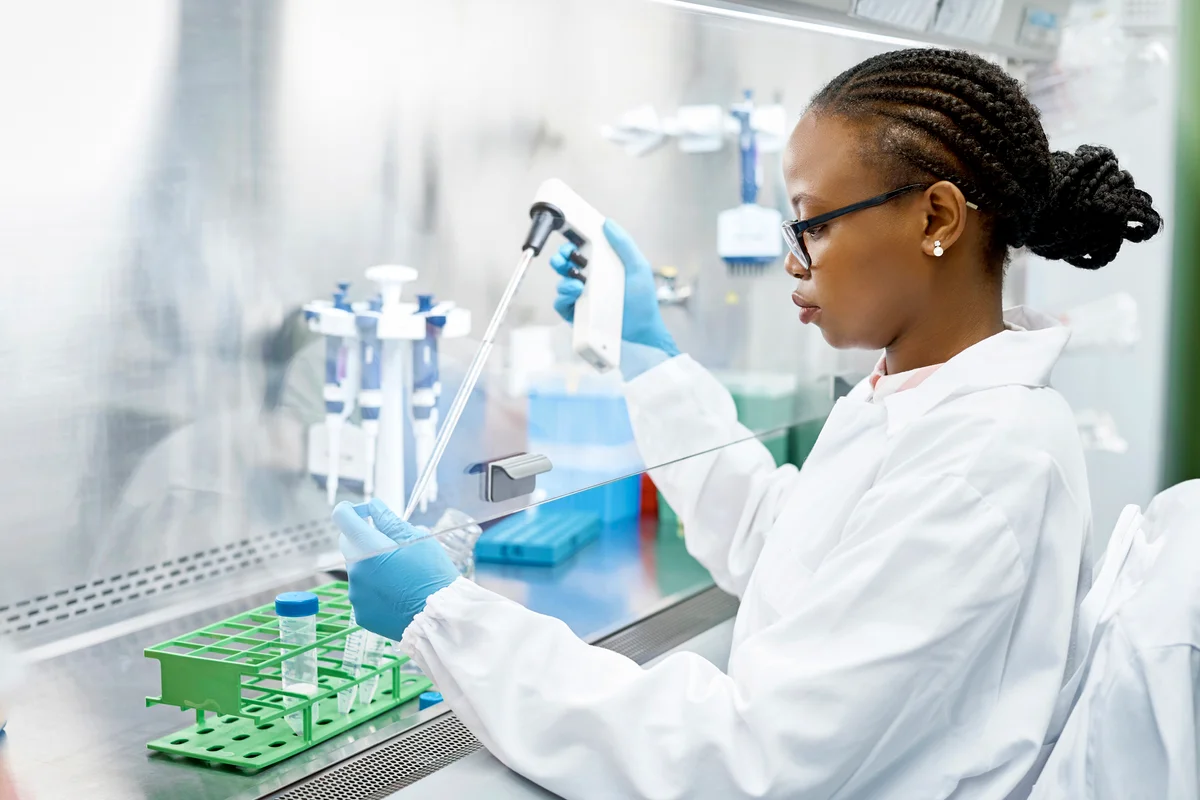 Scientist analyzing medical sample in laboratory