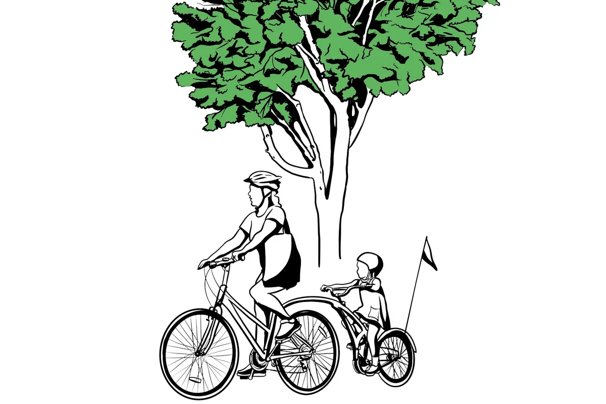mother and child riding bicycles