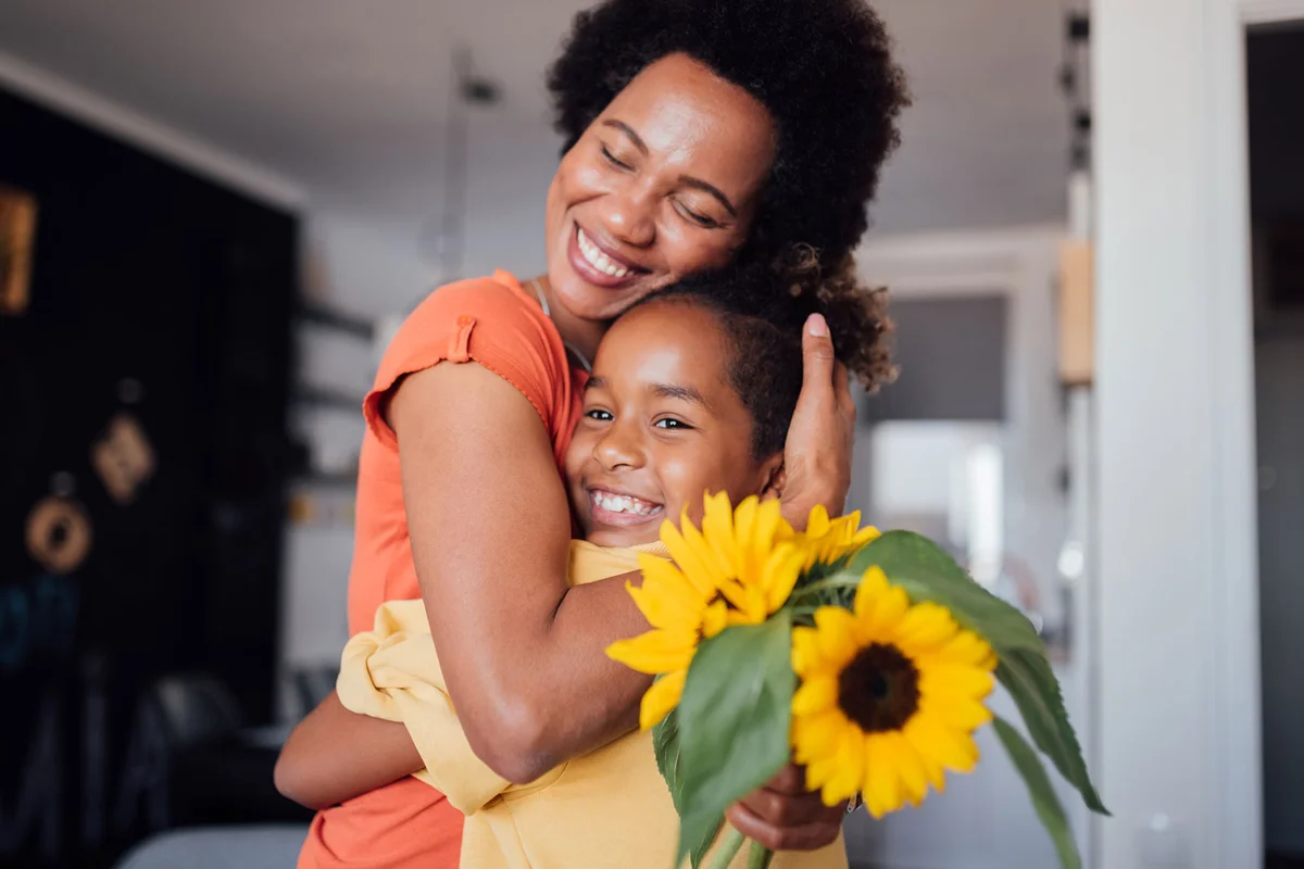 mother and daughter hugging