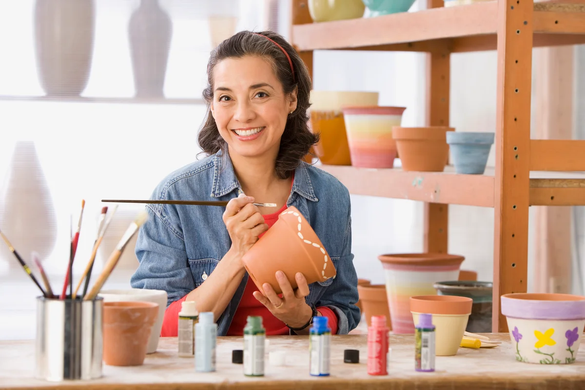 mother painting pottery