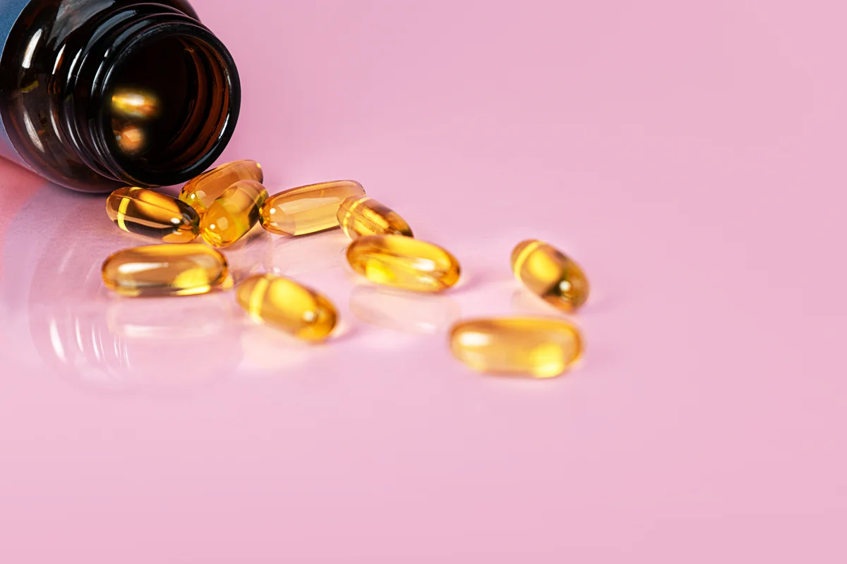 Bottle with vitamins capsules