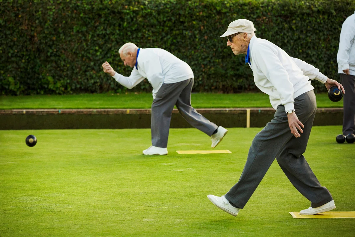 Two men playing Bocce