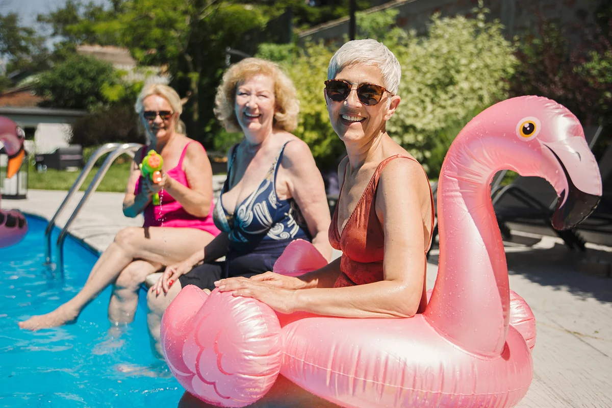Seniors having fun at swimming pool