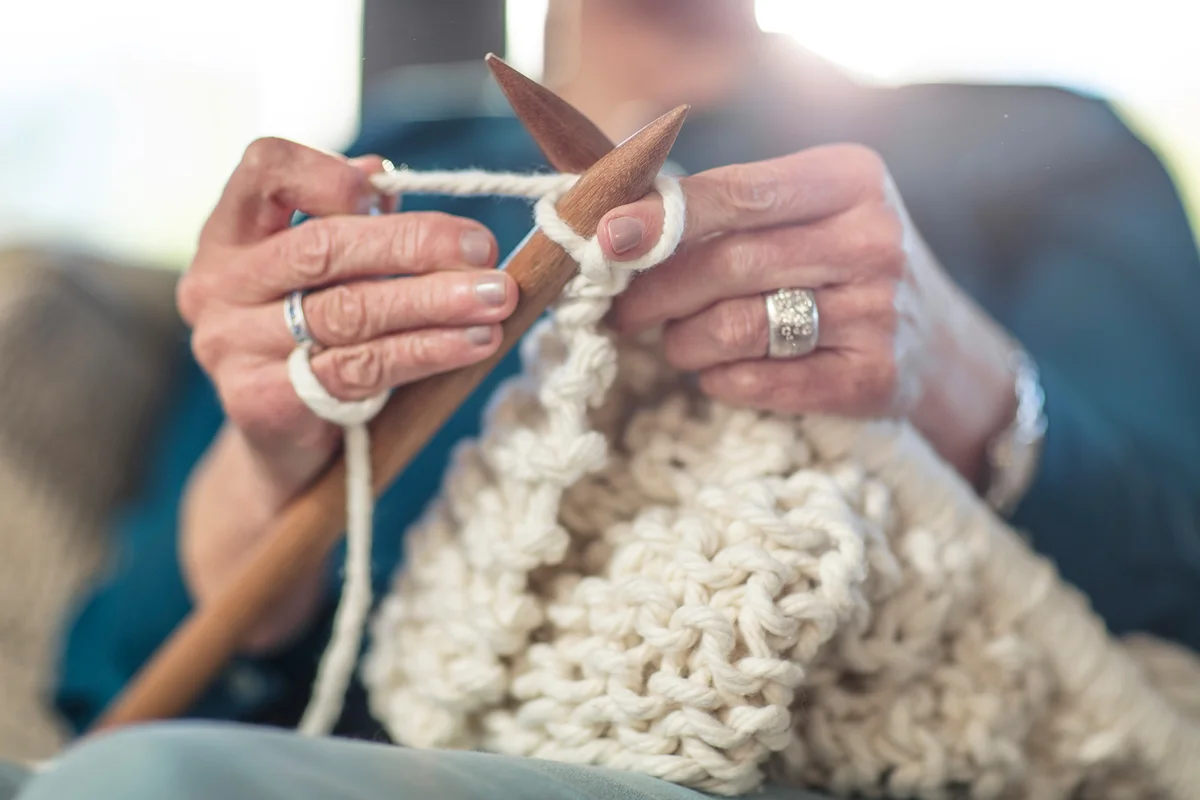 Senior woman knitting