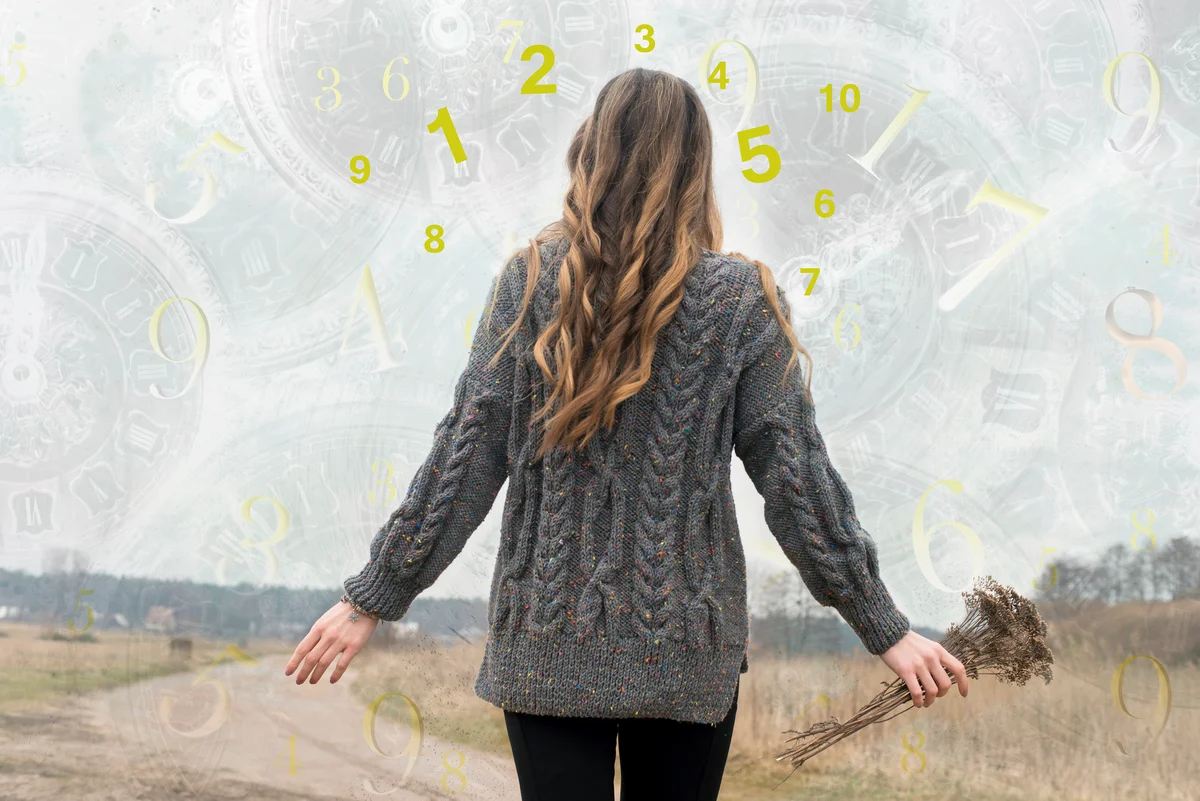 woman looking at numbers to calculate birthday numerology
