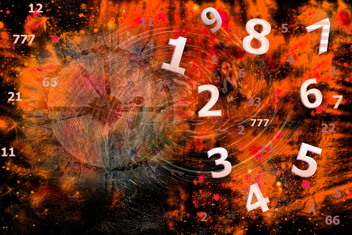 swirling numbers on an orange background