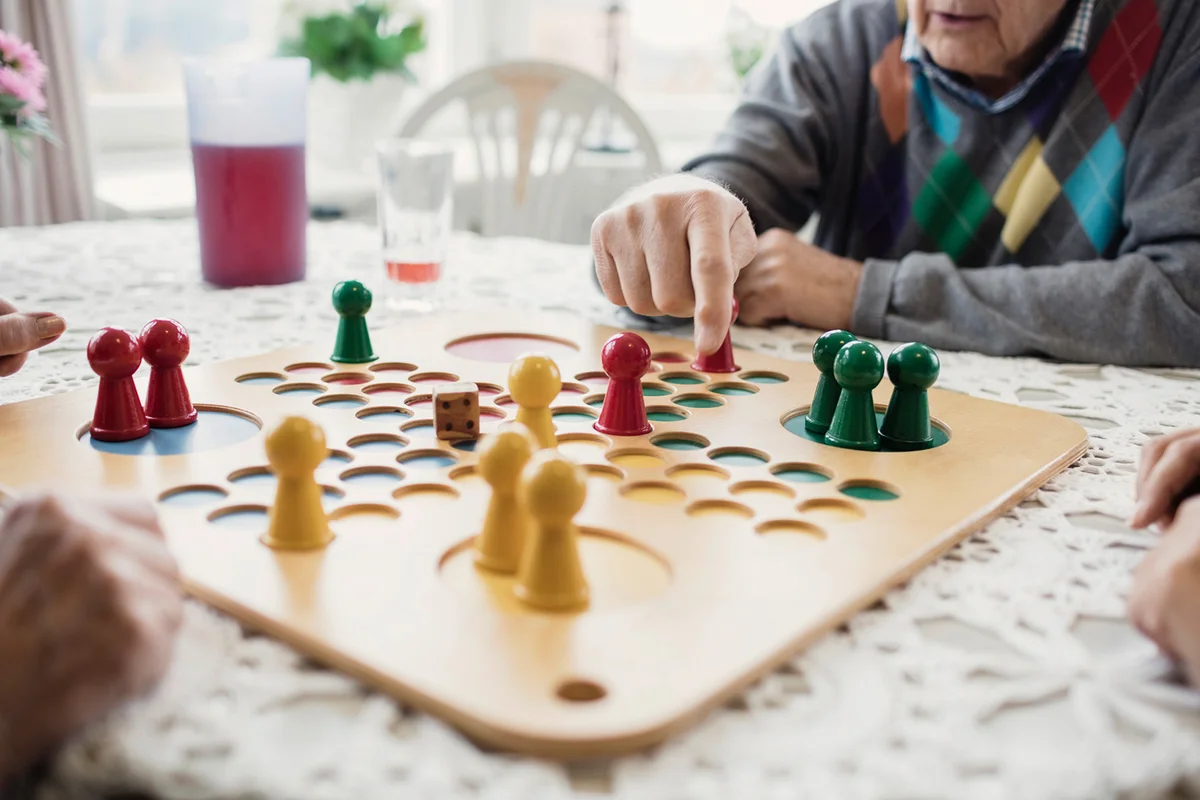People playing Ludo