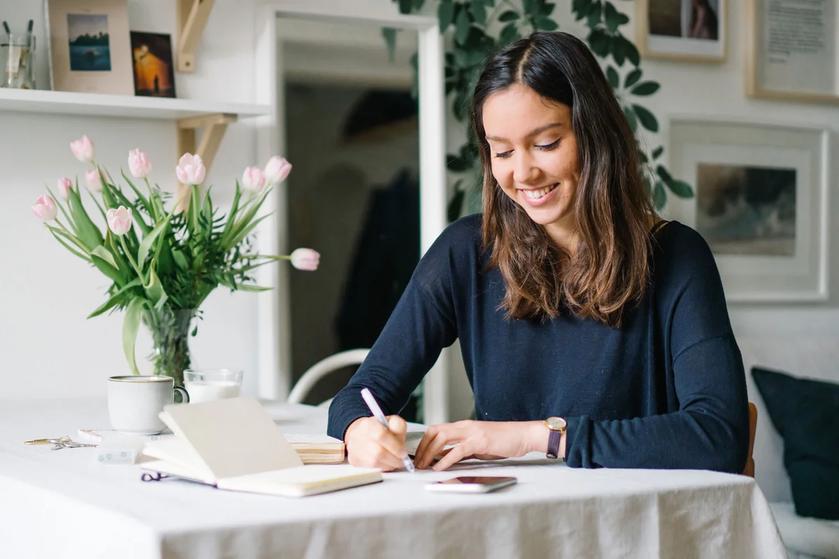 woman writing love note