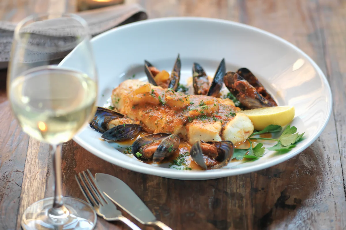 Pan fried halibut with mussels and white wine