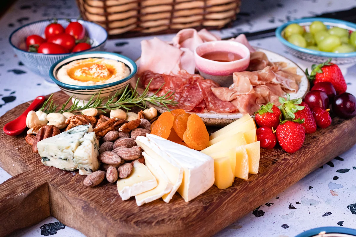 cheese fruit meat charcuterie board
