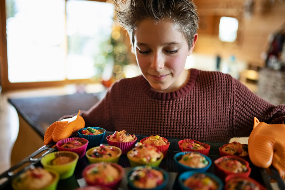 boy baking muffins
