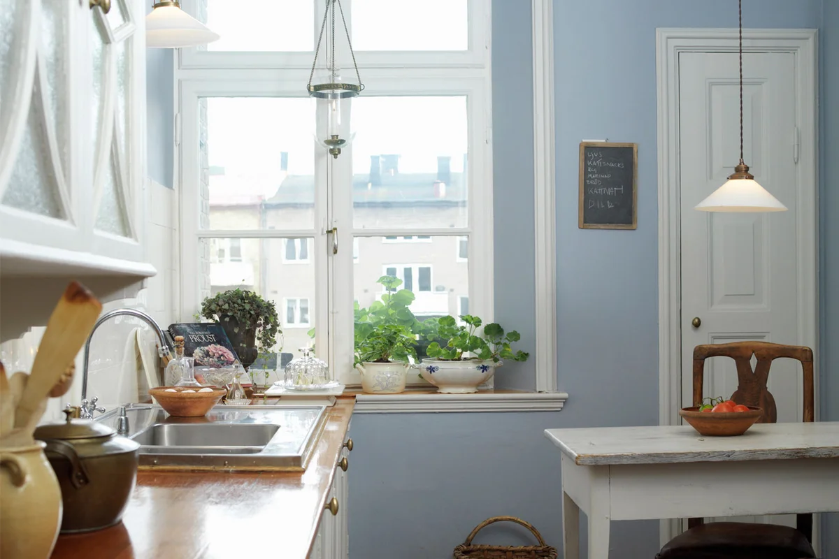 small kitchen with light blue wall