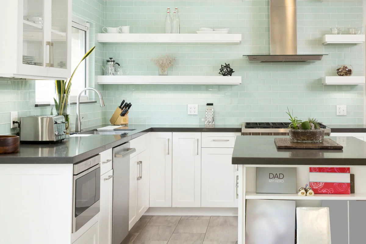 kitchen with mint green tile backsplash