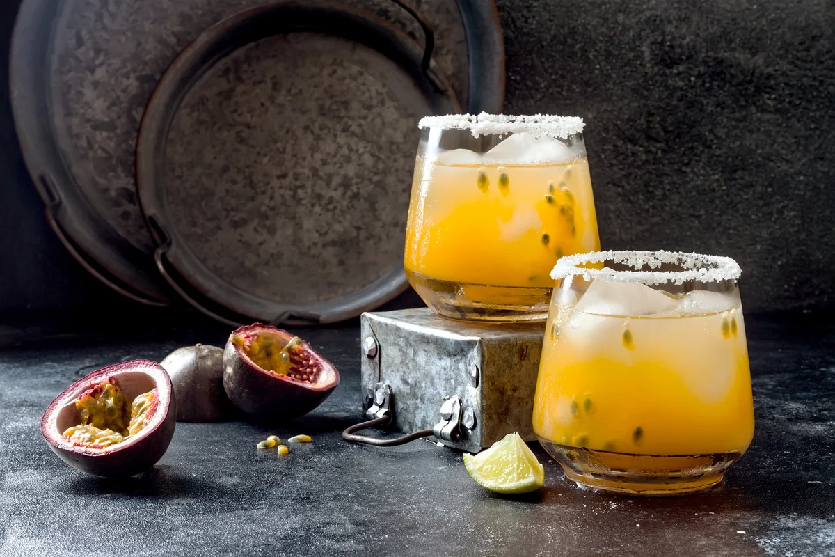 Passionfruit margarita cocktail with lime