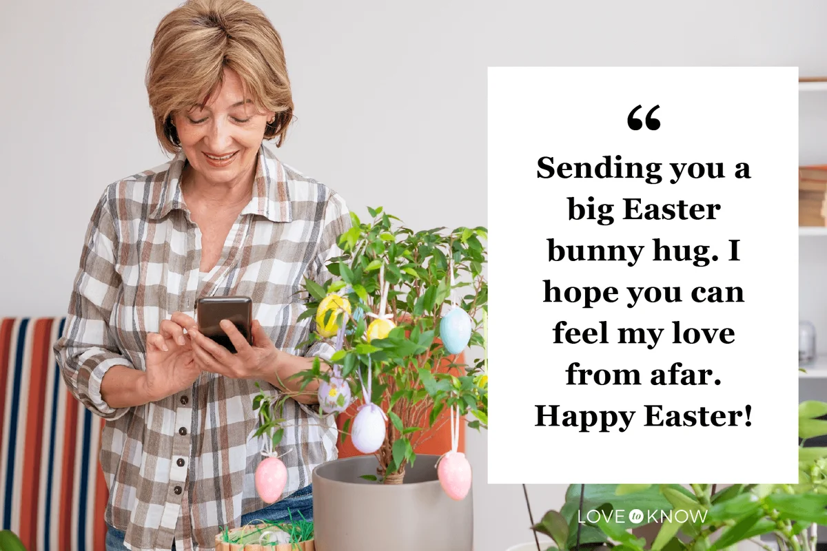 woman decorating potted plant with Easter eggs