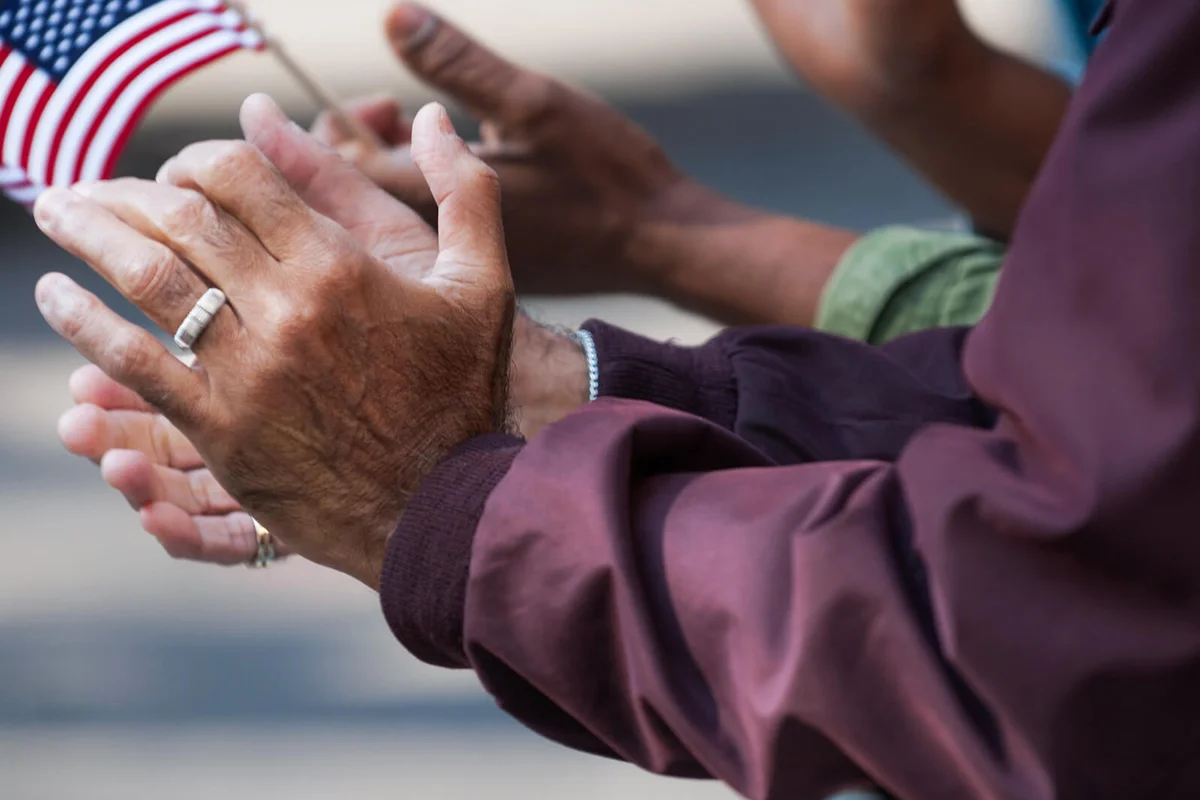 man and woman clapping