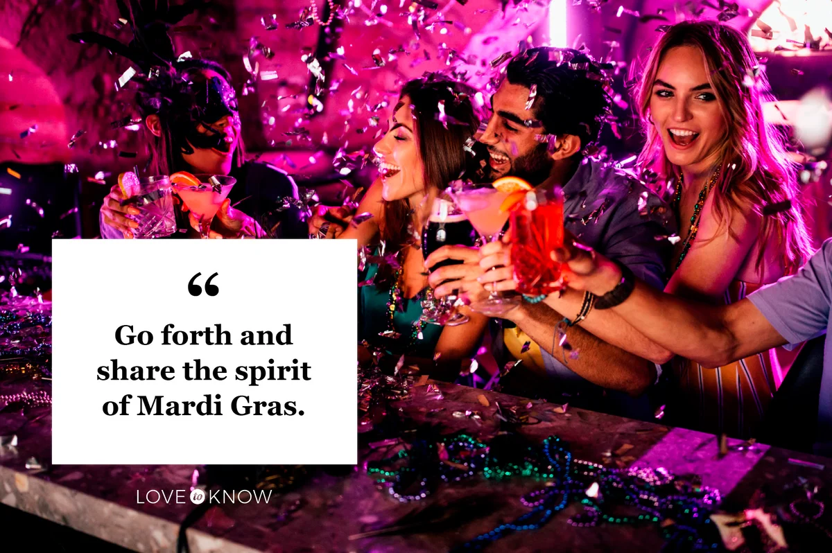 friends toasting with cocktail drink during Mardi Gras